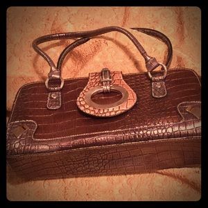 “Alligator” textured brown and gold handbag,